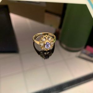 Amethyst and diamond 14 k gold ring.